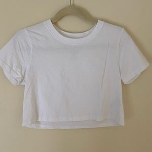 A white cropped tee from Urban Outfitters.